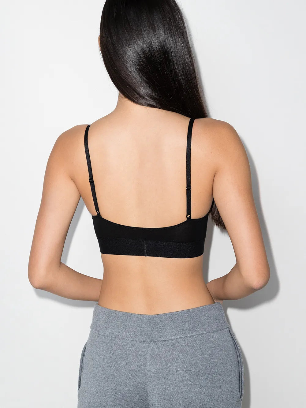 Black activewear worn by a person, showing the activewear's fit