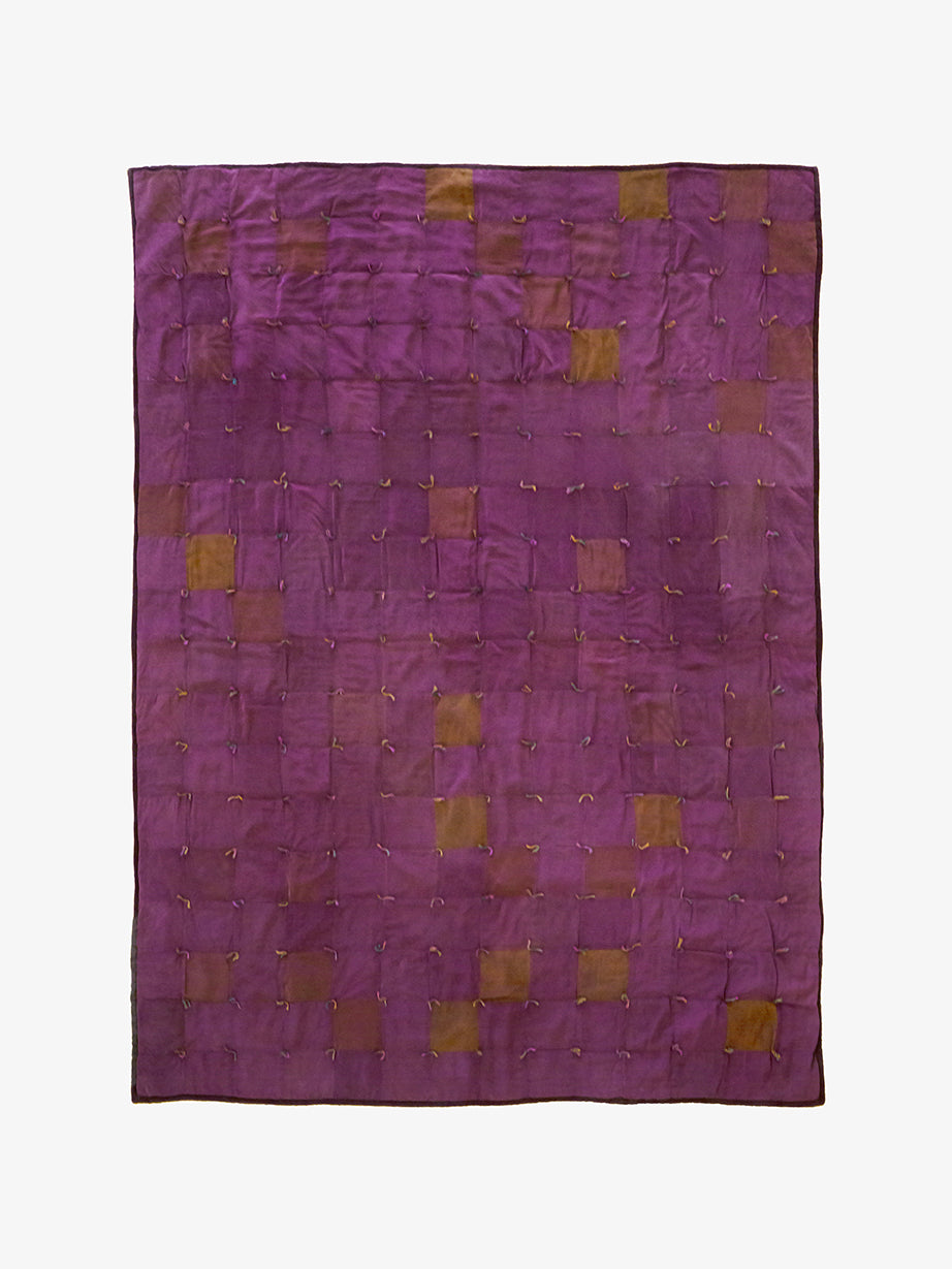 Hand-dyed silk blanket by Lily Raskind in Smoke Brush, shown flat to display patchwork pattern and rich purple tone.