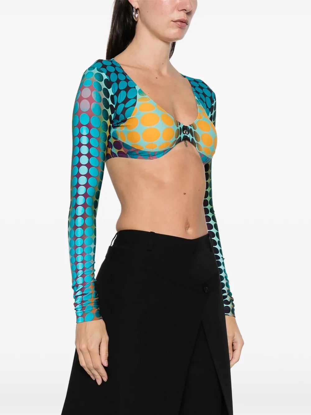 Blue tops worn by a person, showing the tops fit