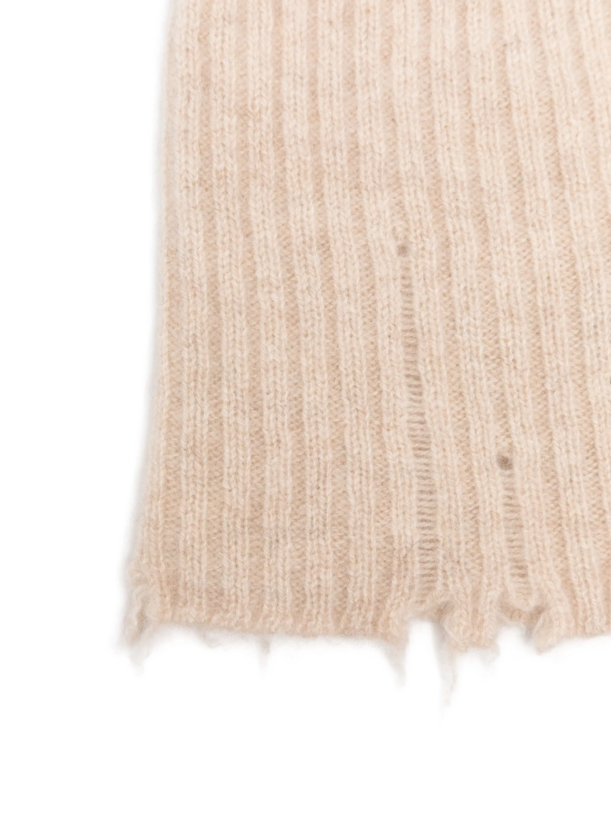 Close up of tan hat, showing texture of the cashmere fabric