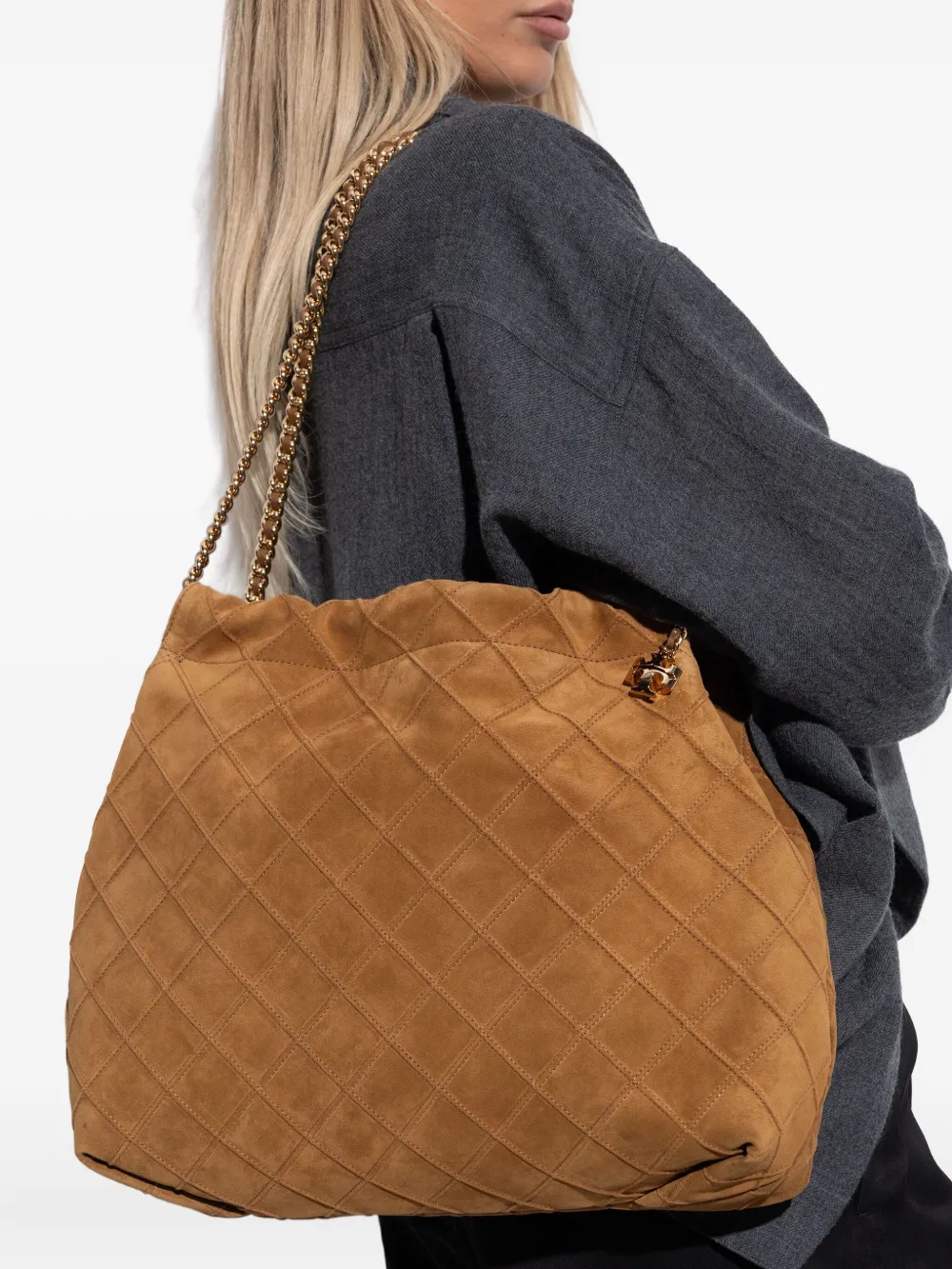 brown bags worn by a person, showing the bags fit