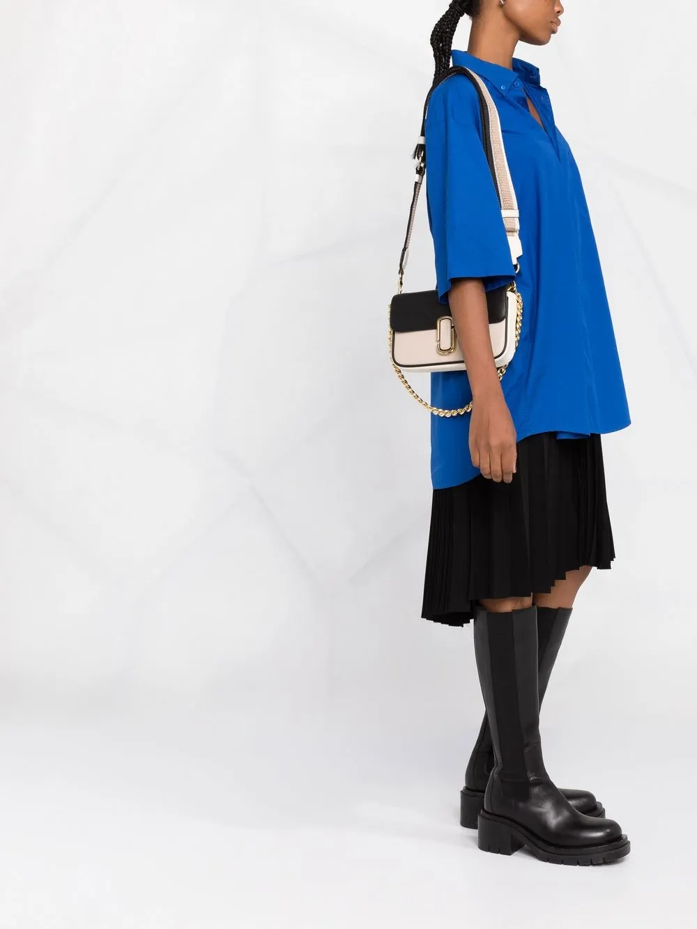 Pink bag worn by a person, showing the bag fit