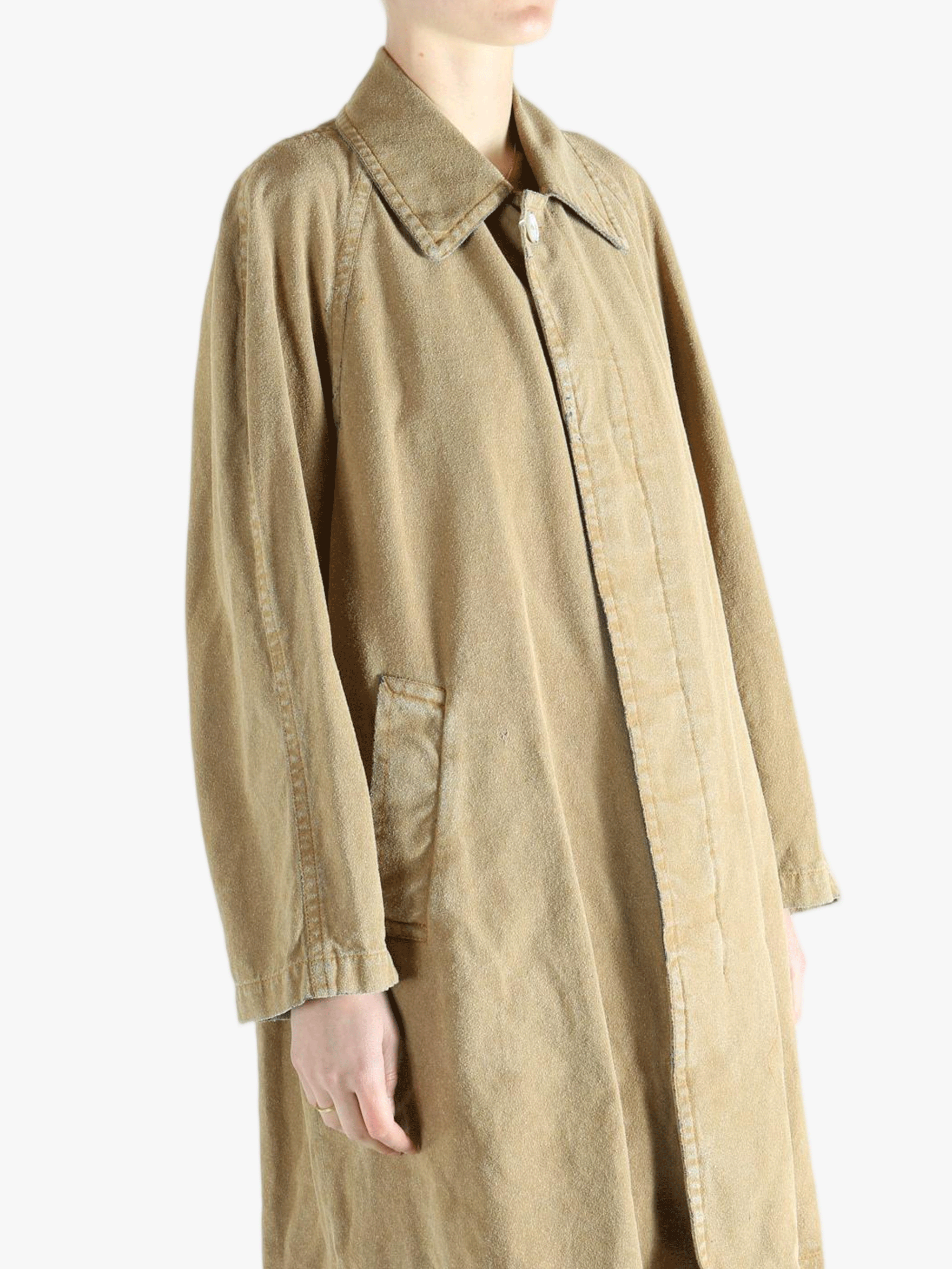 Tan jackets-coats worn by a person, showing the jackets-coats'fit