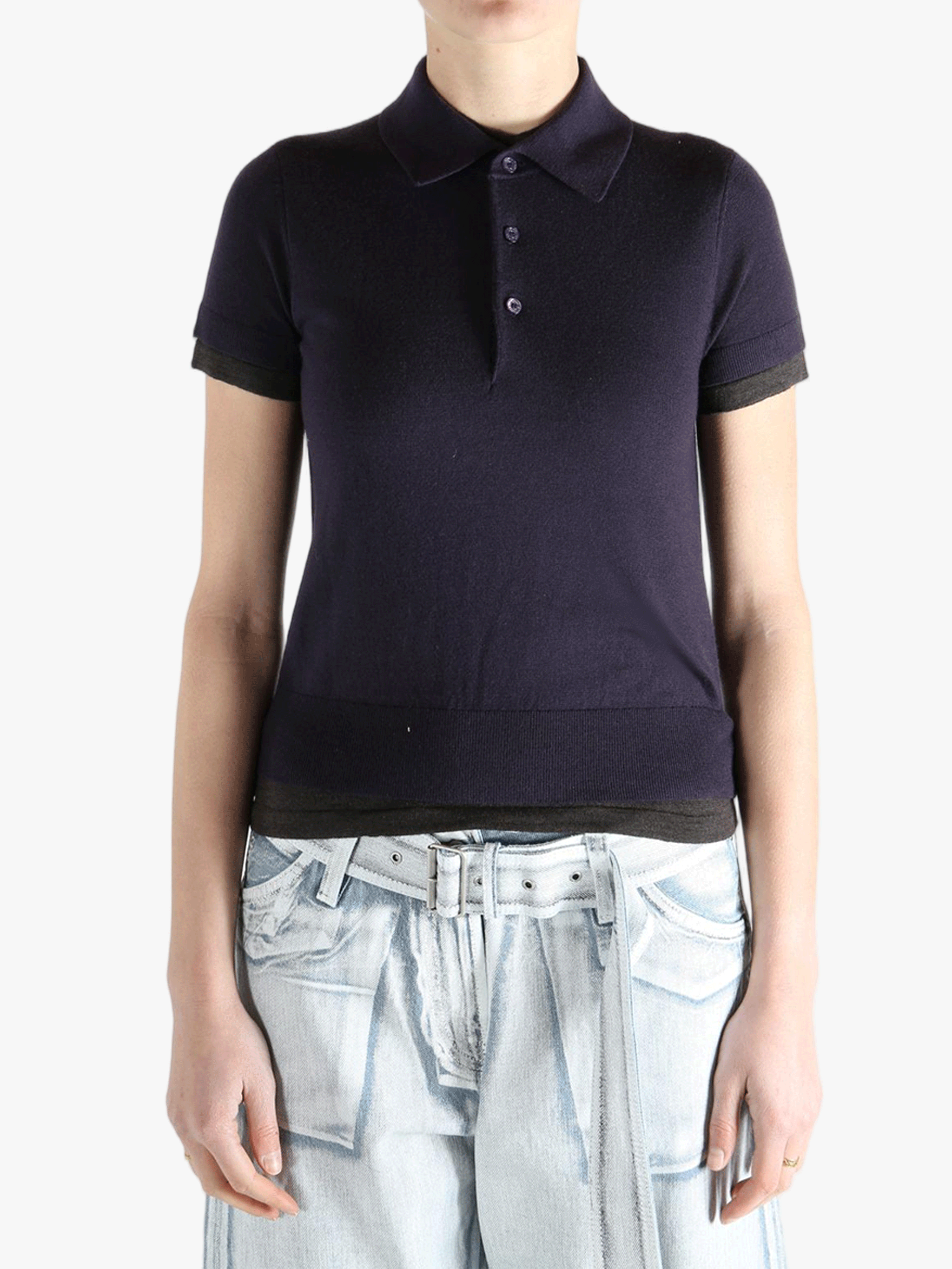 Purple knitwear worn by a person, showing the knitwear'fit