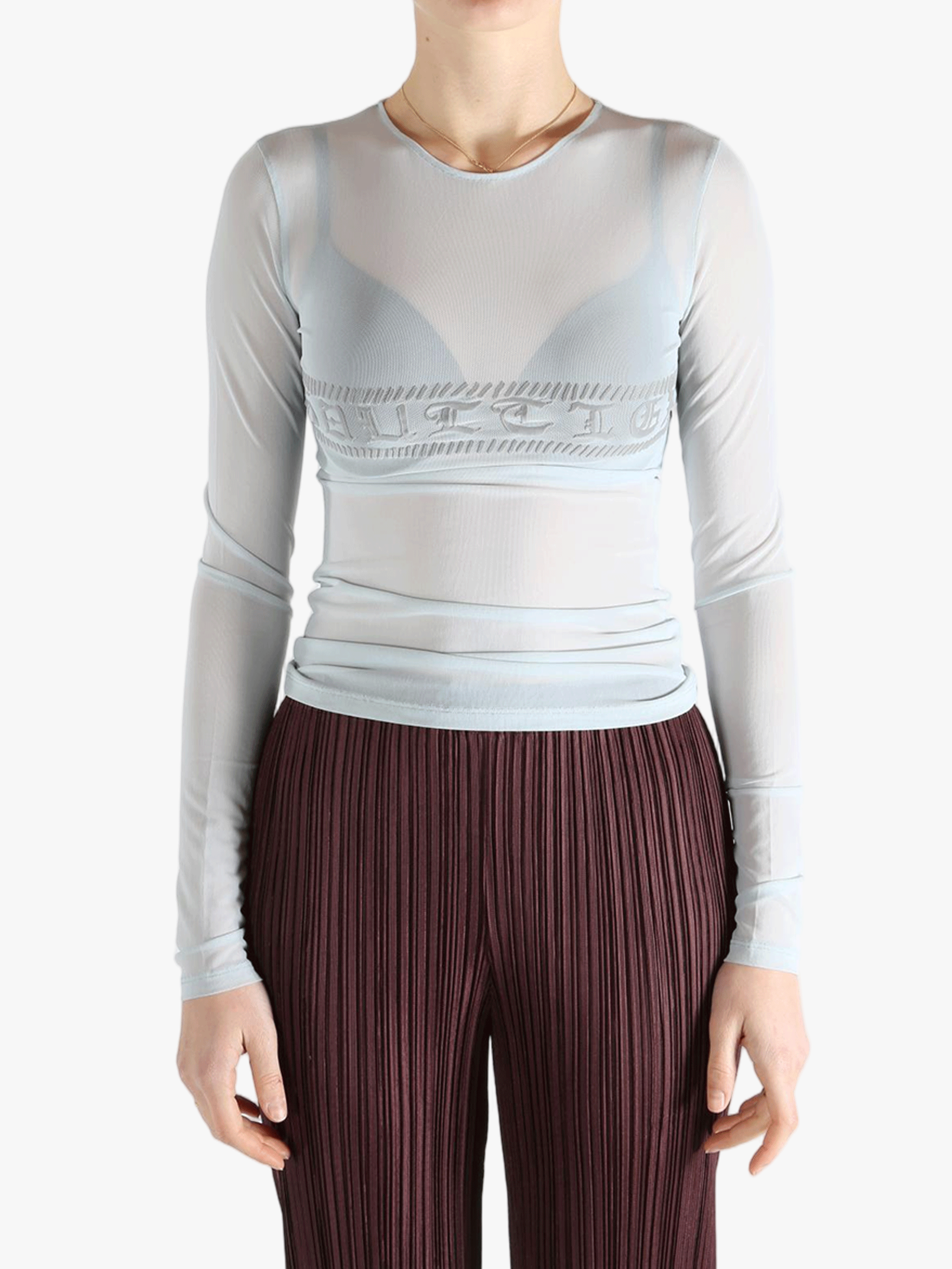 Blue top worn by a person, showing the top'fit