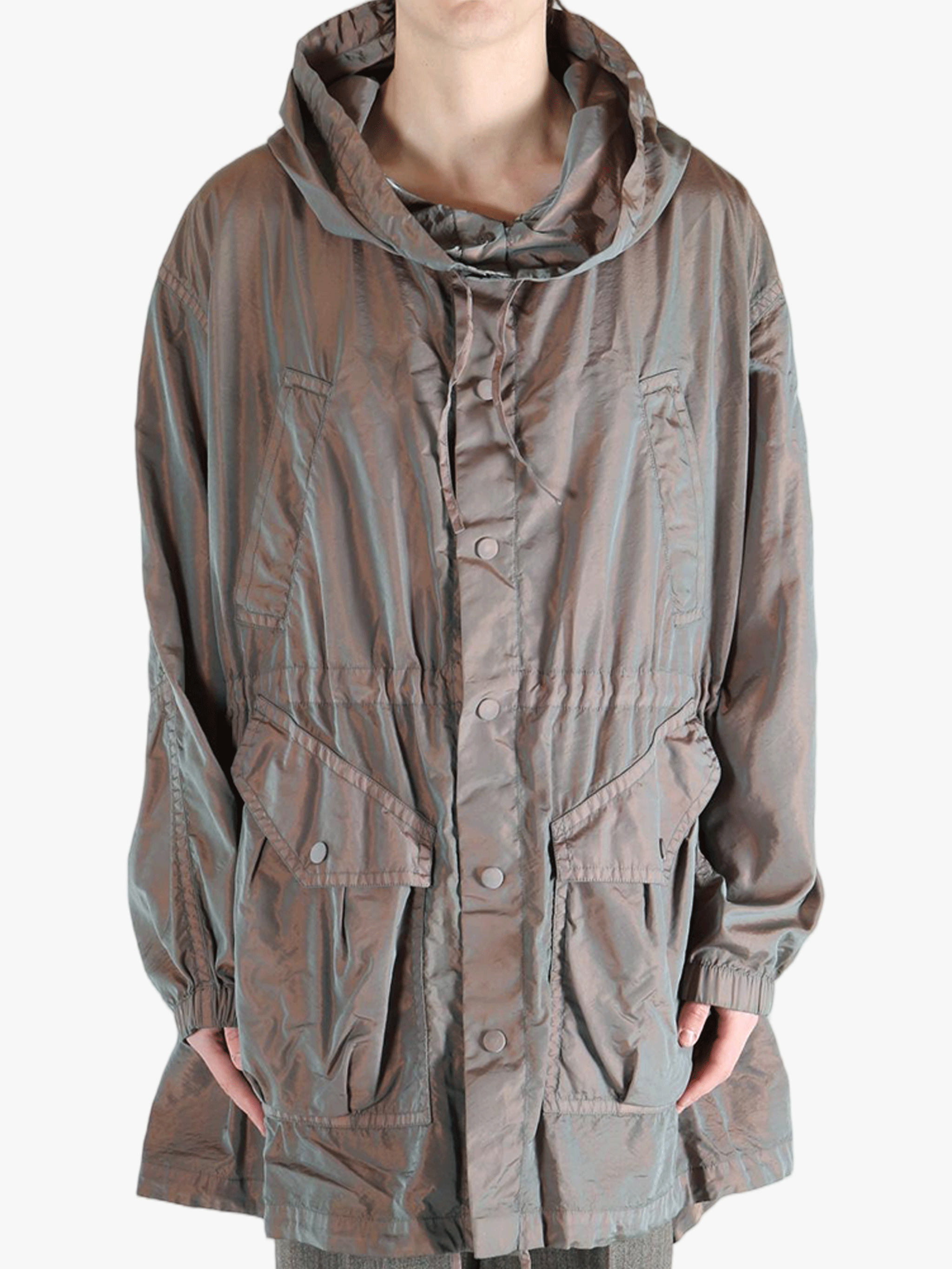 tan jackets-coats worn by a person, showing the jackets-coats fit