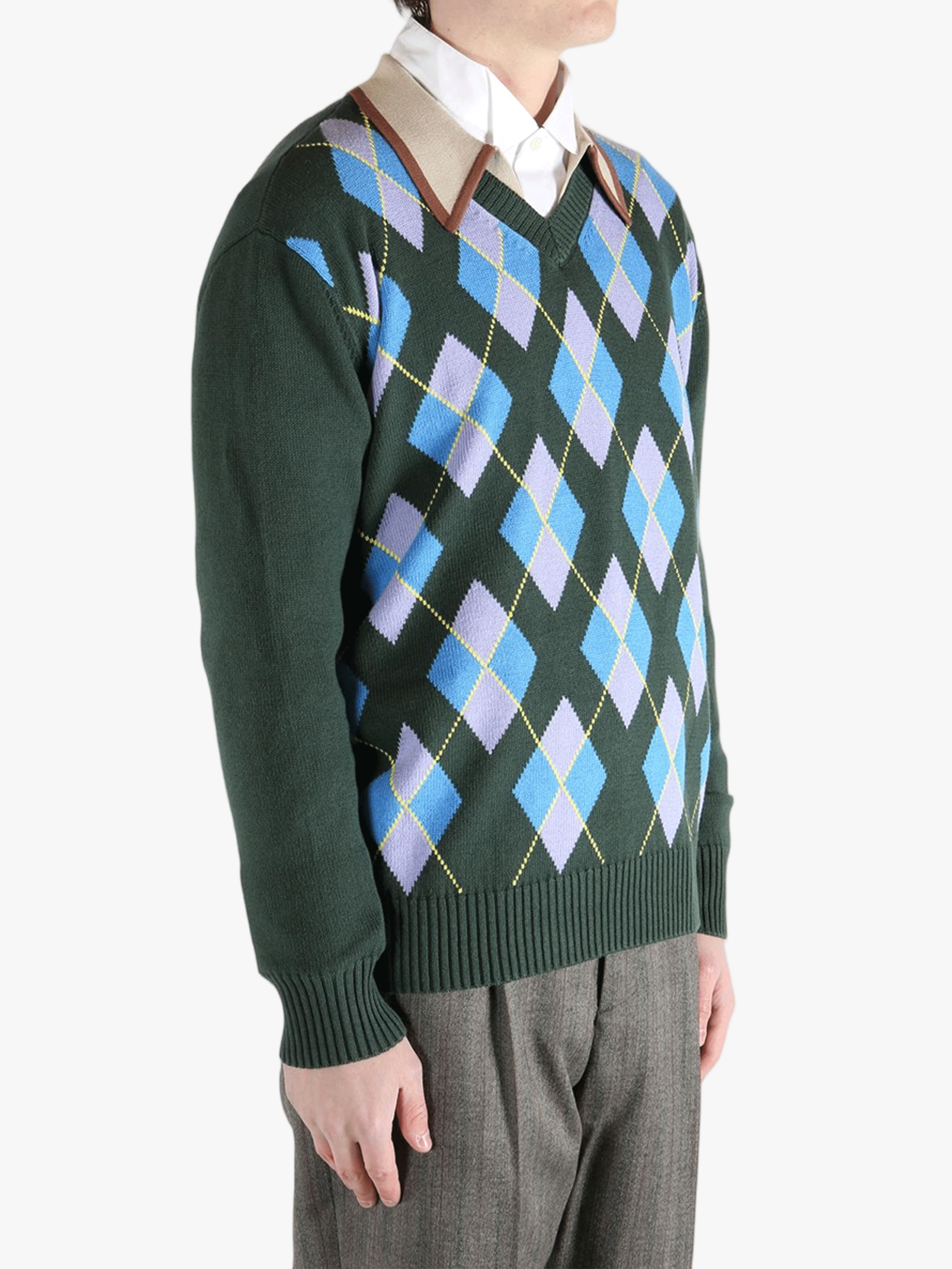 green tops worn by a person, showing the tops fit