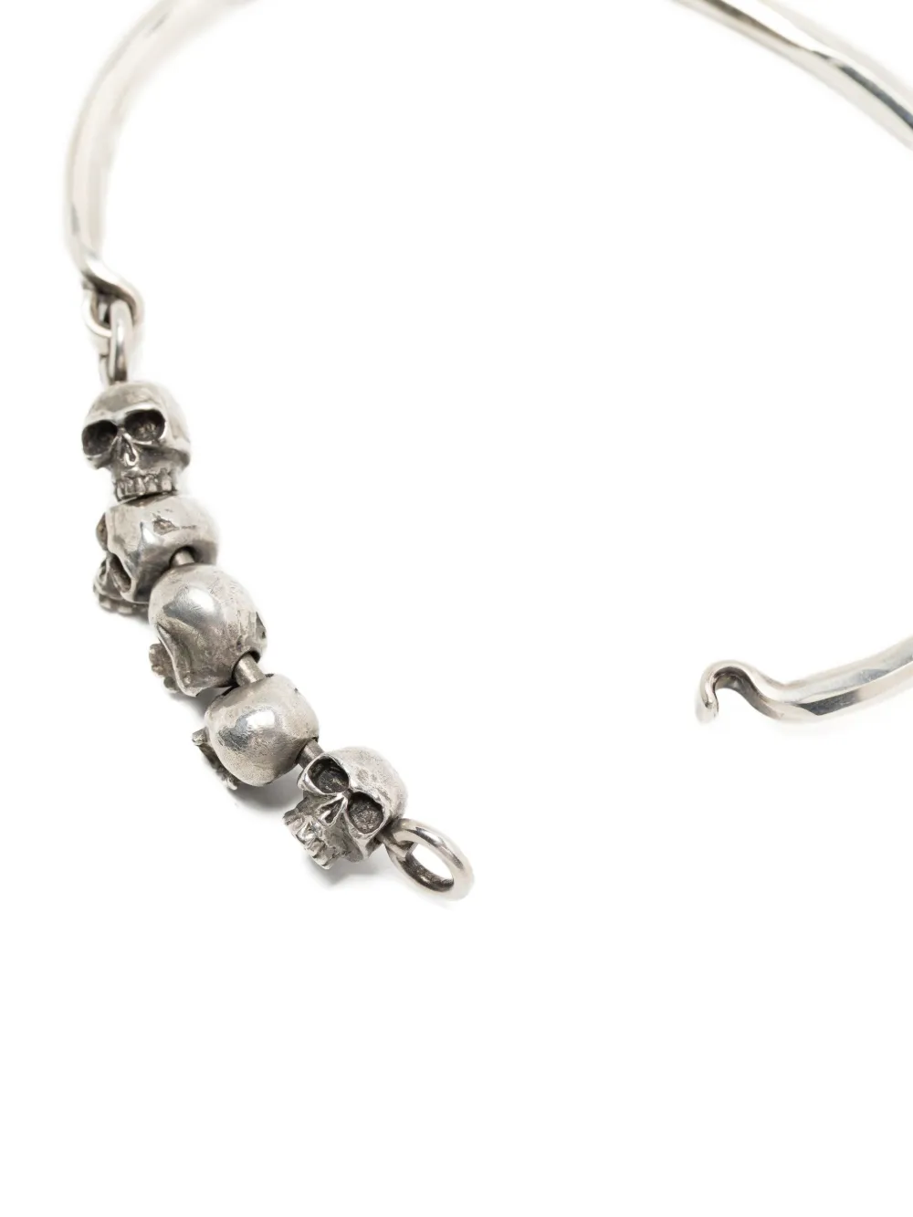 Close up of grey bracelet, showing texture of the silver fabric